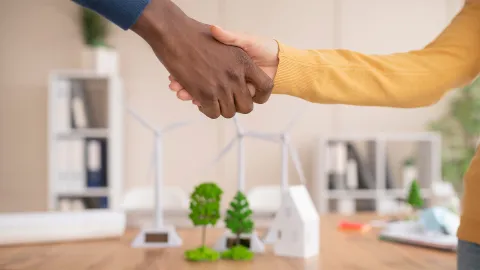 Handshake of two people showing Success through Partnership